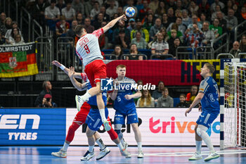 2024-01-15 - Szymon Sicko (Poland) during the Men’s EHF Euro 2024 match between Poland vs. Faroe Islands at the Mercedes-Benz Arena in Berlin, Germany - MEN'S EHF EURO 2024 - POLAND VS FAROE ISLANDS - HANDBALL - OTHER SPORTS