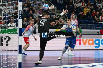 2024-01-15 - Vilhelm Poulsen (Faore Islands) in action against Jakub Skrzyniarz (Poland) and scores a goal during the Men’s EHF Euro 2024 match between Poland vs. Faroe Islands at the Mercedes-Benz Arena in Berlin, Germany - MEN'S EHF EURO 2024 - POLAND VS FAROE ISLANDS - HANDBALL - OTHER SPORTS