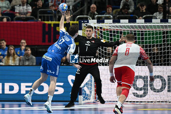 2024-01-15 - 7mt. throw Hakun West av Teigum (Faore Islands) in action against Mateusz Kornecki (Poland) during the Men’s EHF Euro 2024 match between Poland vs. Faroe Islands at the Mercedes-Benz Arena in Berlin, Germany - MEN'S EHF EURO 2024 - POLAND VS FAROE ISLANDS - HANDBALL - OTHER SPORTS