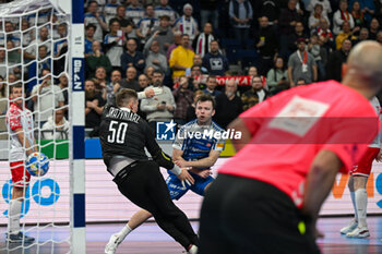2024-01-15 - Hakun West av Teigum (Faore Islands) scores a goal during the Men’s EHF Euro 2024 match between Poland vs. Faroe Islands at the Mercedes-Benz Arena in Berlin, Germany - MEN'S EHF EURO 2024 - POLAND VS FAROE ISLANDS - HANDBALL - OTHER SPORTS