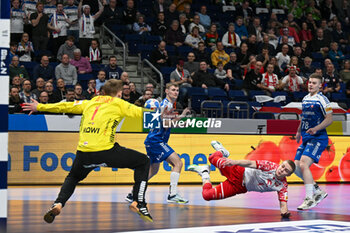 2024-01-15 - Acrobatic save from Goalkeeper Pauli Jacobsen (Faore Islands) during the Men’s EHF Euro 2024 match between Poland vs. Faroe Islands at the Mercedes-Benz Arena in Berlin, Germany - MEN'S EHF EURO 2024 - POLAND VS FAROE ISLANDS - HANDBALL - OTHER SPORTS