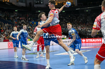 2024-01-15 - Szymon Sicko (Poland) in action against Hakun West av Teigum (Faore Islands) during the Men’s EHF Euro 2024 match between Poland vs. Faroe Islands at the Mercedes-Benz Arena in Berlin, Germany - MEN'S EHF EURO 2024 - POLAND VS FAROE ISLANDS - HANDBALL - OTHER SPORTS