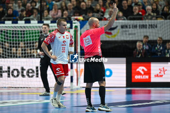 2024-01-15 - 2 minutes suspension for Jakub Szyszko (Poland) during the Men’s EHF Euro 2024 match between Poland vs. Faroe Islands at the Mercedes-Benz Arena in Berlin, Germany - MEN'S EHF EURO 2024 - POLAND VS FAROE ISLANDS - HANDBALL - OTHER SPORTS
