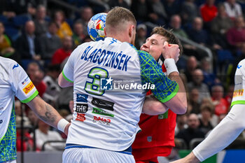 2024-01-15 - Face to face for Goran Sogard Johannessen (Norway) and Blaz Blagotinsek (Slovenia) during the Men’s EHF Euro 2024 match between Norway vs. Slovenia at the Mercedes-Benz Arena in Berlin, Germany - MEN'S EHF EURO 2024 - NORWAY VS SLOVENIA - HANDBALL - OTHER SPORTS