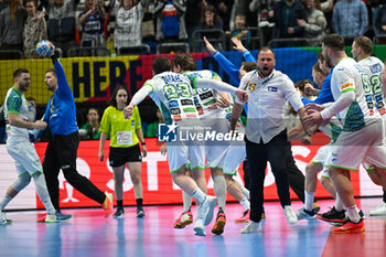 2024-01-15 - Happiness of Head Coach Uros Zorman (Slovenia) and his team after win the Men’s EHF Euro 2024 match between Norway vs. Slovenia at the Mercedes-Benz Arena in Berlin, Germany - MEN'S EHF EURO 2024 - NORWAY VS SLOVENIA - HANDBALL - OTHER SPORTS