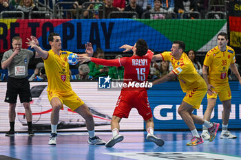 2024-01-16 - Foul on Nicolas Raemy (Swiss) during the Men’s EHF Euro 2024 match between North Macedonia vs. Swiss at the Mercedes-Benz Arena in Berlin, Germany - MEN'S EHF EURO 2024 - NORTH MACEDONIA VS SWISS - HANDBALL - OTHER SPORTS