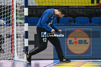 2024-01-16 - Happiness of Martin Tomovski (North Macedonia) after saves the ball during the Men’s EHF Euro 2024 match between North Macedonia vs. Swiss at the Mercedes-Benz Arena in Berlin, Germany - MEN'S EHF EURO 2024 - NORTH MACEDONIA VS SWISS - HANDBALL - OTHER SPORTS