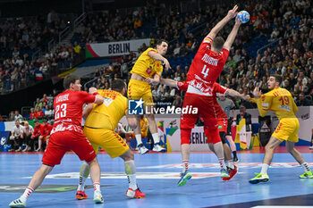2024-01-16 - Lenny Rubin (Swiss) stops the shoot from Filip Taleski (North Macedonia) during the Men’s EHF Euro 2024 match between North Macedonia vs. Swiss at the Mercedes-Benz Arena in Berlin, Germany - MEN'S EHF EURO 2024 - NORTH MACEDONIA VS SWISS - HANDBALL - OTHER SPORTS