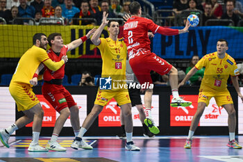 2024-01-16 - Andre Schmid (Swiss) in action against Filip Taleski (North Macedonia) during the Men’s EHF Euro 2024 match between North Macedonia vs. Swiss at the Mercedes-Benz Arena in Berlin, Germany - MEN'S EHF EURO 2024 - NORTH MACEDONIA VS SWISS - HANDBALL - OTHER SPORTS