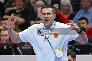 2024-01-16 - Head Coach Lazarov Kiril (North Macedonia) shows his disappointment during the Men’s EHF Euro 2024 match between North Macedonia vs. Swiss at the Mercedes-Benz Arena in Berlin, Germany - MEN'S EHF EURO 2024 - NORTH MACEDONIA VS SWISS - HANDBALL - OTHER SPORTS