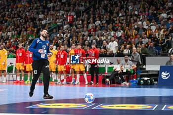 2024-01-16 - Nikola Portner (Swiss) shoot for an empty goal and Martin Tomovski (North Macedonia) can do nothing during the Men’s EHF Euro 2024 match between North Macedonia vs. Swiss at the Mercedes-Benz Arena in Berlin, Germany - MEN'S EHF EURO 2024 - NORTH MACEDONIA VS SWISS - HANDBALL - OTHER SPORTS