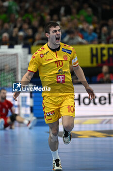 2024-01-16 - Happiness of Marko Mitev (North Macedonia) after scores a goal during the Men’s EHF Euro 2024 match between North Macedonia vs. Swiss at the Mercedes-Benz Arena in Berlin, Germany - MEN'S EHF EURO 2024 - NORTH MACEDONIA VS SWISS - HANDBALL - OTHER SPORTS