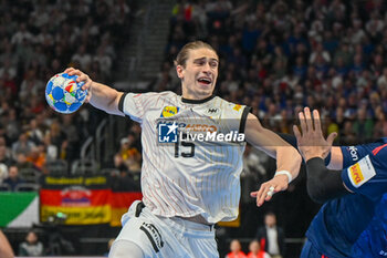 2024-01-16 - Portrait in action of Juri Knorr (Germany) during the Men’s EHF Euro 2024 match between France vs. Germany at the Mercedes-Benz Arena in Berlin, Germany - MEN'S EHF EURO 2024 - FRANCE VS GERMANY - HANDBALL - OTHER SPORTS