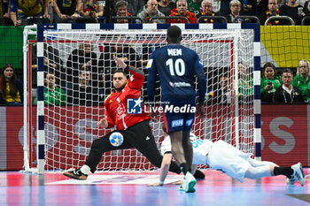 2024-01-16 - 7mt. throw saved by Samir Bellahcene (France) during the Men’s EHF Euro 2024 match between France vs. Germany at the Mercedes-Benz Arena in Berlin, Germany - MEN'S EHF EURO 2024 - FRANCE VS GERMANY - HANDBALL - OTHER SPORTS