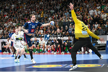2024-01-16 - Valentin Porte (France) underarm goal during the Men’s EHF Euro 2024 match between France vs. Germany at the Mercedes-Benz Arena in Berlin, Germany - MEN'S EHF EURO 2024 - FRANCE VS GERMANY - HANDBALL - OTHER SPORTS