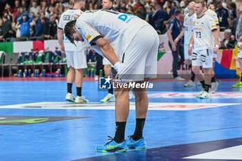 2024-01-16 - Juri Knorr (Germany) shows his disappointment after lose the Men’s EHF Euro 2024 match between France vs. Germany at the Mercedes-Benz Arena in Berlin, Germany - MEN'S EHF EURO 2024 - FRANCE VS GERMANY - HANDBALL - OTHER SPORTS