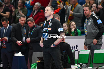 2024-01-16 - Head Coach Alfreo Gislason (Germany) shows his disappointment after lose the Men’s EHF Euro 2024 match between France vs. Germany at the Mercedes-Benz Arena in Berlin, Germany - MEN'S EHF EURO 2024 - FRANCE VS GERMANY - HANDBALL - OTHER SPORTS