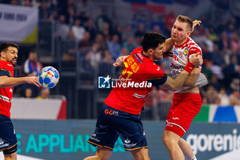 2024-01-12 - Tin Lucin of Croatia and Miguel Sánchez-Migallón of Spain during the Men's EHF Euro 2024, Group B handball match between Spain and Croatia on January 12, 2024 at SAP-Arena in Mannheim, Germany - HANDBALL - MEN'S EHF EURO 2024 - SPAIN V CROATIA - HANDBALL - OTHER SPORTS