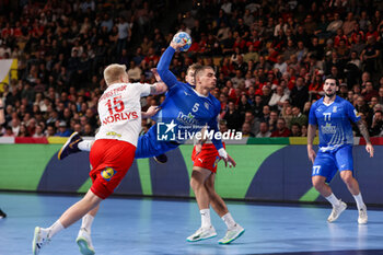 2024-01-13 - Dimitrios Panagiotou of Greece and Magnus Saugstrup Jensen of Denmark during the Men's Euro 2024, Group F handball match between Greece and Denmark on January 13, 2024 at Olympiahalle in Munich, Germany - HANDBALL - MEN'S EHF EURO 2024 - GREECE V DENMARK - HANDBALL - OTHER SPORTS