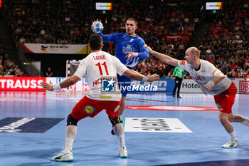 2024-01-13 - Dimitrios Panagiotou of Greece and Simon Hald Jensen of Denmark during the Men's Euro 2024, Group F handball match between Greece and Denmark on January 13, 2024 at Olympiahalle in Munich, Germany - HANDBALL - MEN'S EHF EURO 2024 - GREECE V DENMARK - HANDBALL - OTHER SPORTS
