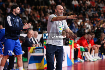 2024-01-13 - Coach Georgios Zaravinas of Greece during the Men's Euro 2024, Group F handball match between Greece and Denmark on January 13, 2024 at Olympiahalle in Munich, Germany - HANDBALL - MEN'S EHF EURO 2024 - GREECE V DENMARK - HANDBALL - OTHER SPORTS