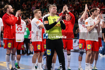 2024-01-13 - Denmark players celebrate during the Men's Euro 2024, Group F handball match between Greece and Denmark on January 13, 2024 at Olympiahalle in Munich, Germany - HANDBALL - MEN'S EHF EURO 2024 - GREECE V DENMARK - HANDBALL - OTHER SPORTS