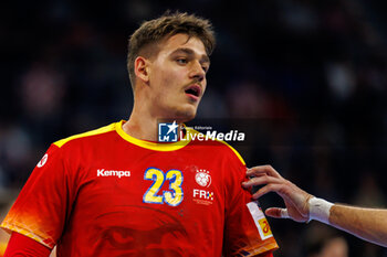 2024-01-14 - Calin Dedu of Romania during the Men's Euro 2024, Group B handball match between Romania and Spain on January 14, 2024 at SAP-Arena in Mannheim, Germany - HANDBALL - MEN'S EHF EURO 2024 - ROMANIA V SPAIN - HANDBALL - OTHER SPORTS