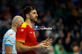 2024-01-14 - Dan Emil Racotea of Romania during the Men's Euro 2024, Group B handball match between Romania and Spain on January 14, 2024 at SAP-Arena in Mannheim, Germany - HANDBALL - MEN'S EHF EURO 2024 - ROMANIA V SPAIN - HANDBALL - OTHER SPORTS