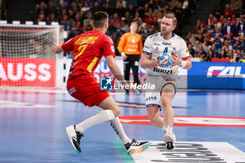 2024-01-14 - Aron Palmarsson of Iceland and Vasilije Kaludjerovic of Montenegro during the Men's Euro 2024, Group C handball match between Montenegro and Iceland on January 14, 2024 at Olympiahalle in Munich, Germany - HANDBALL - MEN'S EHF EURO 2024 - MONTENEGRO V ICELAND - HANDBALL - OTHER SPORTS