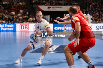2024-01-14 - Omar Ingi Magnusson of Iceland during the Men's Euro 2024, Group C handball match between Montenegro and Iceland on January 14, 2024 at Olympiahalle in Munich, Germany - HANDBALL - MEN'S EHF EURO 2024 - MONTENEGRO V ICELAND - HANDBALL - OTHER SPORTS