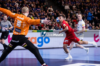 2024-01-14 - Milos Vujovic of Montenegro during the Men's Euro 2024, Group C handball match between Montenegro and Iceland on January 14, 2024 at Olympiahalle in Munich, Germany - HANDBALL - MEN'S EHF EURO 2024 - MONTENEGRO V ICELAND - HANDBALL - OTHER SPORTS