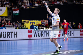 2024-01-14 - Ellidi Vidarsson of Iceland during the Men's Euro 2024, Group C handball match between Montenegro and Iceland on January 14, 2024 at Olympiahalle in Munich, Germany - HANDBALL - MEN'S EHF EURO 2024 - MONTENEGRO V ICELAND - HANDBALL - OTHER SPORTS