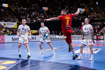 2024-01-14 - Vuk Lazovic of Montenegro during the Men's Euro 2024, Group C handball match between Montenegro and Iceland on January 14, 2024 at Olympiahalle in Munich, Germany - HANDBALL - MEN'S EHF EURO 2024 - MONTENEGRO V ICELAND - HANDBALL - OTHER SPORTS