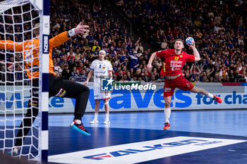 2024-01-14 - Mirko Radovic of Montenegro during the Men's Euro 2024, Group C handball match between Montenegro and Iceland on January 14, 2024 at Olympiahalle in Munich, Germany - HANDBALL - MEN'S EHF EURO 2024 - MONTENEGRO V ICELAND - HANDBALL - OTHER SPORTS