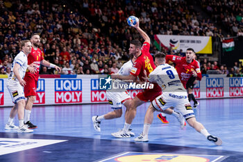 2024-01-14 - Radojica Cepic of Montenegro and Elvar Jonsson of Iceland during the Men's Euro 2024, Group C handball match between Montenegro and Iceland on January 14, 2024 at Olympiahalle in Munich, Germany - HANDBALL - MEN'S EHF EURO 2024 - MONTENEGRO V ICELAND - HANDBALL - OTHER SPORTS