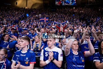 2024-01-14 - Iceland fans during the Men's Euro 2024, Group C handball match between Montenegro and Iceland on January 14, 2024 at Olympiahalle in Munich, Germany - HANDBALL - MEN'S EHF EURO 2024 - MONTENEGRO V ICELAND - HANDBALL - OTHER SPORTS