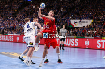 2024-01-14 - Radojica Cepic of Montenegro and Aron Palmarsson of Iceland during the Men's Euro 2024, Group C handball match between Montenegro and Iceland on January 14, 2024 at Olympiahalle in Munich, Germany - HANDBALL - MEN'S EHF EURO 2024 - MONTENEGRO V ICELAND - HANDBALL - OTHER SPORTS