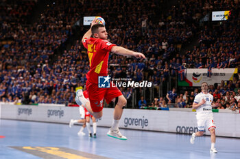 2024-01-14 - Luka Radovic of Montenegro during the Men's Euro 2024, Group C handball match between Montenegro and Iceland on January 14, 2024 at Olympiahalle in Munich, Germany - HANDBALL - MEN'S EHF EURO 2024 - MONTENEGRO V ICELAND - HANDBALL - OTHER SPORTS