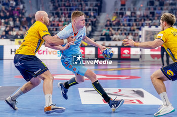2024-01-15 - Niels Versteijnen of The Netherlands is challenged by Oscar Bergendahl of Sweden during the Men's EHF Euro 2024, Group E handball match between Sweden and Netherlands on January 15, 2024 at SAPP Arena in Mannheim, Germany - HANDBALL - MEN'S EHF EURO 2024 - SWEDEN V NETHERLANDS - HANDBALL - OTHER SPORTS