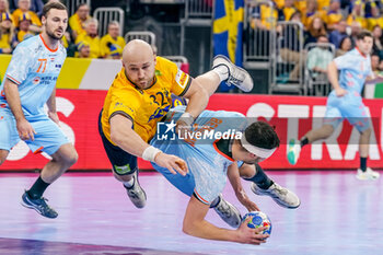 2024-01-15 - Samir Benghanem of The Netherlands is challenged by Oscar Bergendahl of Sweden during the Men's EHF Euro 2024, Group E handball match between Sweden and Netherlands on January 15, 2024 at SAPP Arena in Mannheim, Germany - HANDBALL - MEN'S EHF EURO 2024 - SWEDEN V NETHERLANDS - HANDBALL - OTHER SPORTS