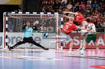 2024-01-15 - Martim Costa of Portugal and Niklas Landin Jacobsen of Denmark during the Men's Euro 2024, Group F handball match between Denmark and Portugal on January 15, 2024 at Olympiahalle in Munich, Germany - HANDBALL - MEN'S EHF EURO 2024 - DENMARK V PORTUGAL - HANDBALL - OTHER SPORTS