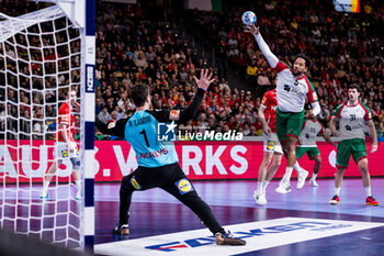 2024-01-15 - Niklas Landin Jacobsen of Denmark and Gilberto Duarte of Portugal during the Men's Euro 2024, Group F handball match between Denmark and Portugal on January 15, 2024 at Olympiahalle in Munich, Germany - HANDBALL - MEN'S EHF EURO 2024 - DENMARK V PORTUGAL - HANDBALL - OTHER SPORTS