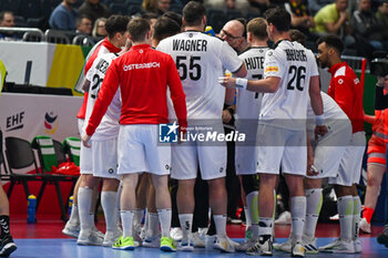2024-01-18 - Austria on time out during the Men’s EHF Euro 2024 match between Hungary vs.Austria at the Lanxess Arena in Berlin, Cologne - MEN'S EHF EURO 2024 - HUNGARY VS AUSTRIA - HANDBALL - OTHER SPORTS