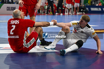 2024-01-18 - Adrian Sipos (Hungary) and Lukas Hutecek (Austria) during the Men’s EHF Euro 2024 match between Hungary vs.Austria at the Lanxess Arena in Berlin, Cologne - MEN'S EHF EURO 2024 - HUNGARY VS AUSTRIA - HANDBALL - OTHER SPORTS