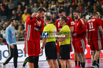 2024-01-18 - Bence Banhidi (Hungary) complain with the referee for the last decision after the Men’s EHF Euro 2024 match between Hungary vs.Austria at the Lanxess Arena in Berlin, Cologne - MEN'S EHF EURO 2024 - HUNGARY VS AUSTRIA - HANDBALL - OTHER SPORTS