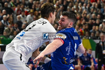 2024-01-18 - Aron Palmarsson (Iceland) in action against Julian Koster (Germany) during the Men’s EHF Euro 2024 match between Germany vs. Iceland at the Lanxess Arena in Berlin, Cologne - MEN'S EHF EURO 2024 - GERMANY VS ICELAND - HANDBALL - OTHER SPORTS