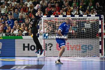 2024-01-18 - Viktor Hallgrimsson (Iceland) saves the ball during the Men’s EHF Euro 2024 match between Germany vs. Iceland at the Lanxess Arena in Berlin, Cologne - MEN'S EHF EURO 2024 - GERMANY VS ICELAND - HANDBALL - OTHER SPORTS