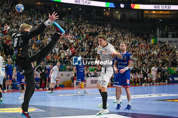 2024-01-18 - Rune Dahmke (Germany) scores a goal with a lob during the Men’s EHF Euro 2024 match between Germany vs. Iceland at the Lanxess Arena in Berlin, Cologne - MEN'S EHF EURO 2024 - GERMANY VS ICELAND - HANDBALL - OTHER SPORTS