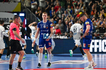 2024-01-18 - Ellioi Vioarsson (Iceland) and Elvar Jonsson (Iceland) shows his disappointment after they lose Men’s EHF Euro 2024 match between Germany vs. Iceland at the Lanxess Arena in Berlin, Cologne - MEN'S EHF EURO 2024 - GERMANY VS ICELAND - HANDBALL - OTHER SPORTS