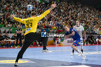 2024-01-18 - Omar Ingi Magnusson (Iceland) on 7m. throw during the Men’s EHF Euro 2024 match between Germany vs. Iceland at the Lanxess Arena in Berlin, Cologne - MEN'S EHF EURO 2024 - GERMANY VS ICELAND - HANDBALL - OTHER SPORTS